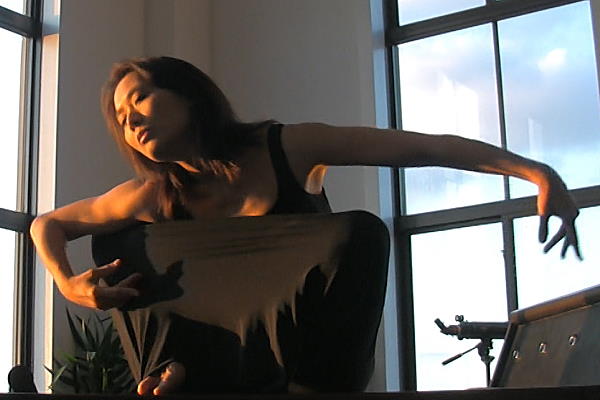 Mana Hashimoto in a video still from a dance called
